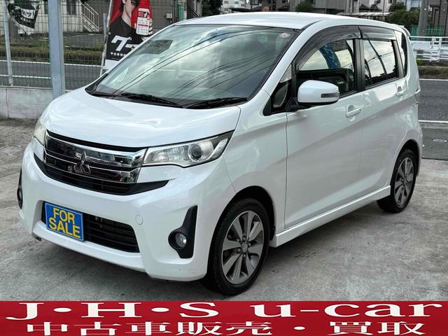 三菱　ｅＫカスタム　Ｔ　バックカメラ　ナビ　ＴＶ　オートライト　ＨＩＤ　スマートキー　電動格納ミラー　ベンチシート　ＣＶＴ　盗難防止システム　ＡＢＳ　ＣＤ　ミュージックプレイヤー接続可　Ｂｌｕｅｔｏｏｔｈ　アルミホイール
