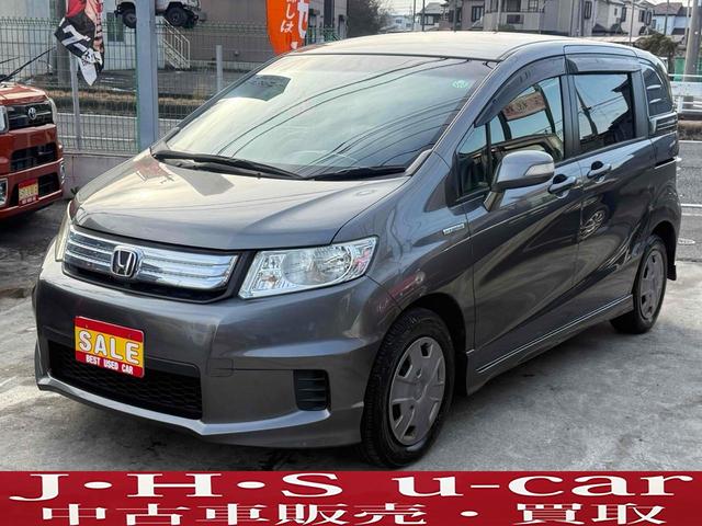 ホンダ　フリードスパイクハイブリッド　ハイブリッド　ＥＴＣ　バックカメラ　ナビ　ＴＶ　両側スライドドア　キーレスエントリー　電動格納ミラー　ＣＶＴ　ＣＤ　ＤＶＤ再生　ＵＳＢ　ＡＢＳ　ＥＳＣ　エアコン　パワーステアリング　パワーウィンドウ